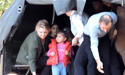 Ethnic Armenians of Nagorno-Karabakh evacuate from their homes